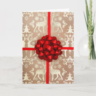 Ein Bogen und ein Band auf WeihnachtsPackpapier Feiertagskarte