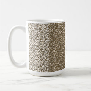 Ein brauner Teppich mit einem geometrischen Motiv Kaffeetasse