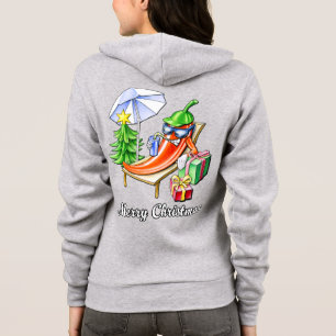 Ein Chili frohe Weihnachten unter Sonnenschirm und Hoodie