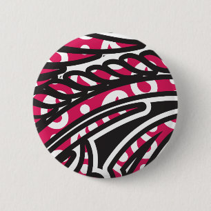 Ein dekoratives Paisley-Design mit lebendigem Rot Button
