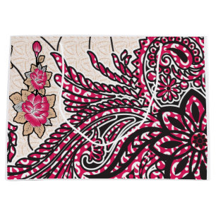 Ein dekoratives Paisley-Design mit lebhaftem Rot u Große Geschenktüte