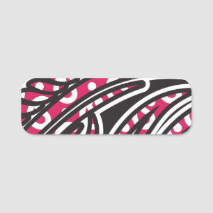 Ein dekoratives Paisley-Design mit lebhaftem Rot u Namensschild