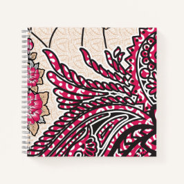 Ein dekoratives Paisley-Design mit lebhaftem Rot u Notizbuch