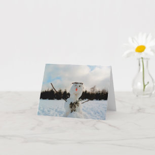 Ein echter Schneemann und ein Winterlandschaft Fot Karte