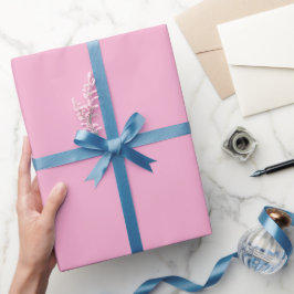 Ein einheitlicher, weicher rosa Hintergrund Geschenkpapier
