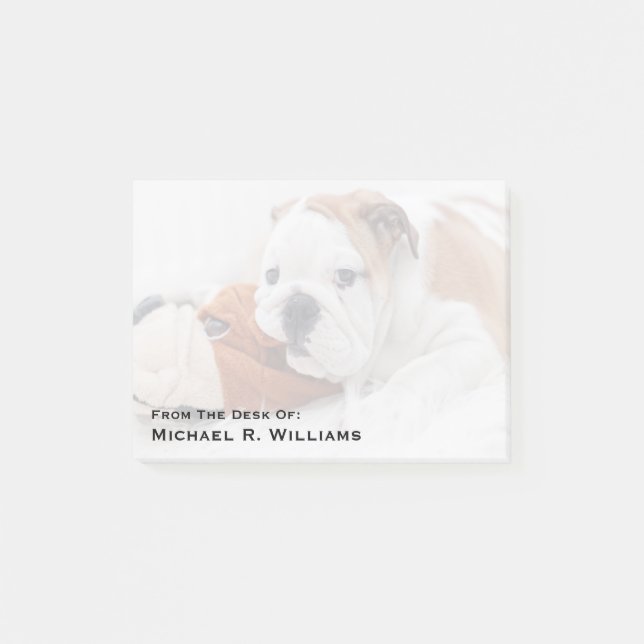 Ein englischer Bulldog-Welpe, der mit einem Bulldo Post-it Klebezettel (Vorderseite)
