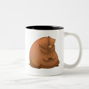 Ein fettes Schwein auf einer Tasse