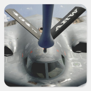 Ein Flugzeug des Geistes B-2, das in Position Quadratischer Aufkleber