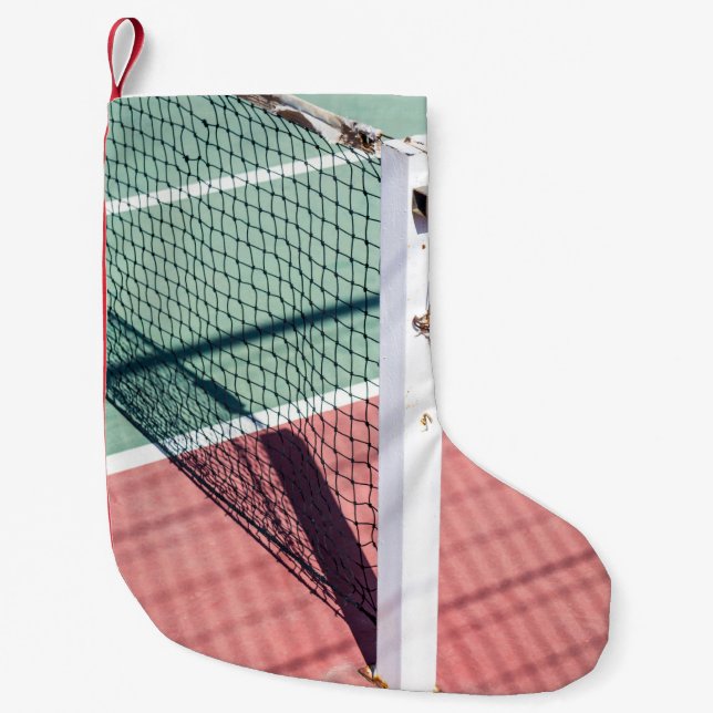 EIN FOKUSSIERTER SCHOT EINES POSTS AUF EINER SEITE KLEINER WEIHNACHTSSTRUMPF (Vorderseite)