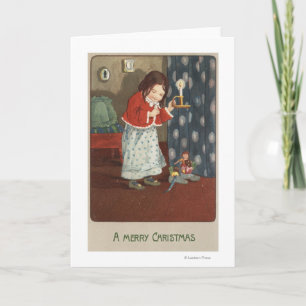 Ein frohes Weihnachtsmädchen, das einen Candlestic Feiertagskarte