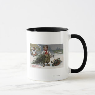 Ein fröhliches ChristmasBoy mit einem Schnitt-Bau Tasse