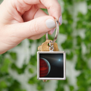 Ein Gasriese um einen weißen Zwergstern herum. Schlüsselanhänger