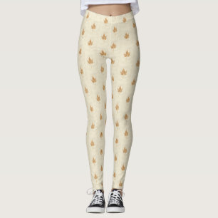 Ein gefliestes Bild aus einem goldfarbenen Ahornbl Leggings