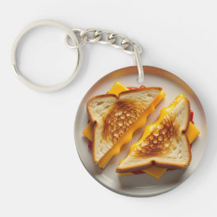 Ein gegrilltes Käsesandwich auf einem Teller Schlüsselanhänger