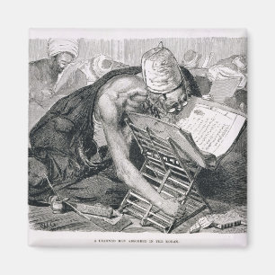 Ein gelernter Mann, der im Koran absorbiert wird Magnet