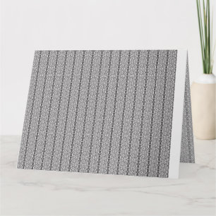 Ein geometrisches, weißes und graues Muster füllt Karte
