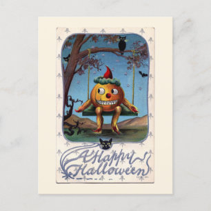 Ein glücklicher Halloween-Kürbis auf der Schaukel Postkarte