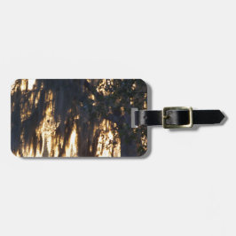 ein goldener Winteraufgang durch den spanischen Mo Gepäckanhänger