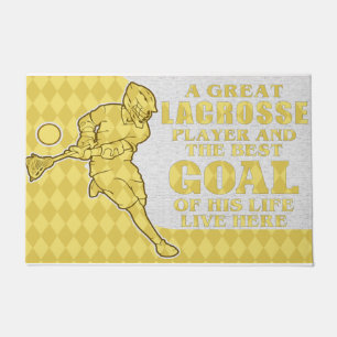 Ein großer Lacrosse Spieler und das beste Ziel sei Fußmatte