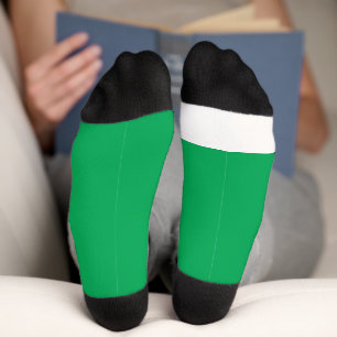 ein grüner Hintergrund mit Socken
