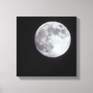 Ein heller Vollmond in einem schwarzen Nachthimmel Leinwanddruck