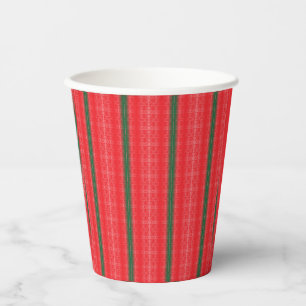Ein hellroter Apfel sitzt auf einer schlichten, we Pappbecher