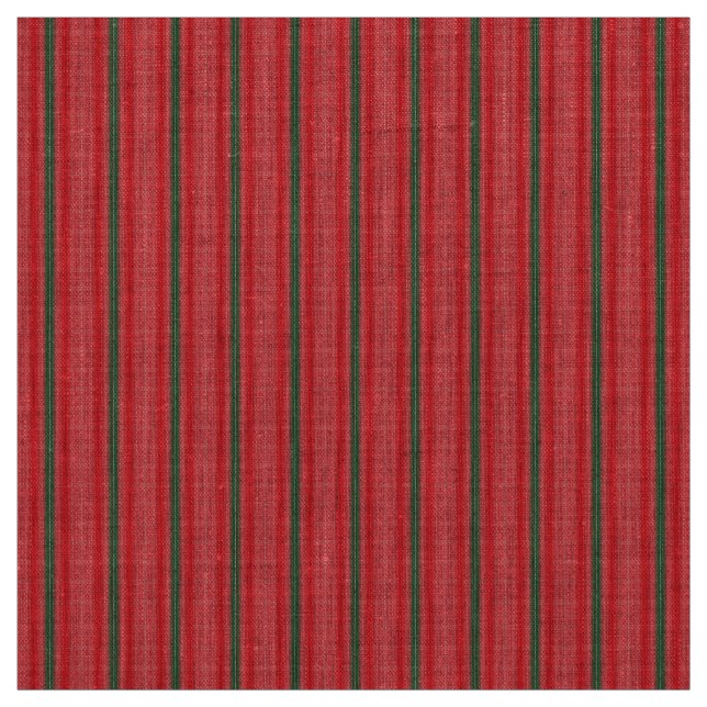 Ein hellroter Apfel sitzt auf einer schlichten, we Stoff (Muster)