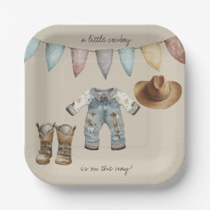 Ein kleiner Cowboy ist auf der Papiertafel Pappteller