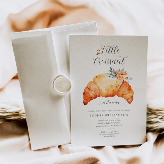Ein kleines Croissant ist unterwegs mit einer Baby Einladung (Von Creator hochgeladen)