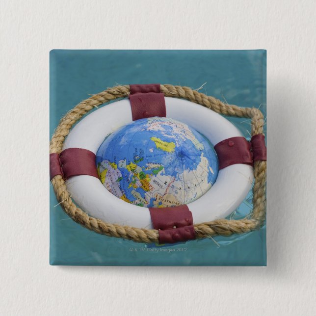 Ein lebenserhaltender und treibender Globus Button (Vorderseite)