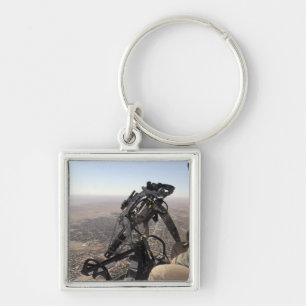 Ein Leiter der Crew sucht verdächtige Aktivitäten Schlüsselanhänger