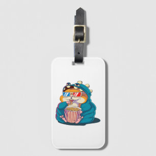 Ein lustiger Hamster mit Brille isst Popcorn Gepäckanhänger