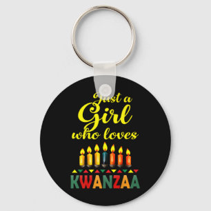 Ein Mädchen, das Kwanzaa Kinara Afrikanischer Stol Schlüsselanhänger