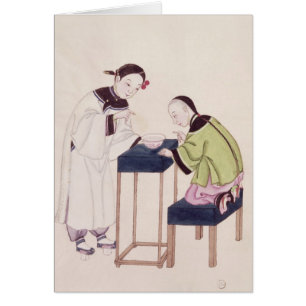 Ein Mädchen, das nach Glück in eine Schüssel