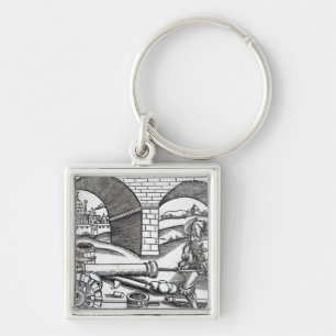 Ein Mann, der eine Kanone lädt Schlüsselanhänger