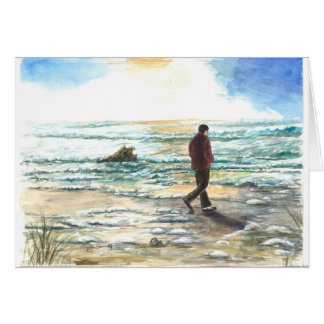 Ein Mann im Gedanken am Strand