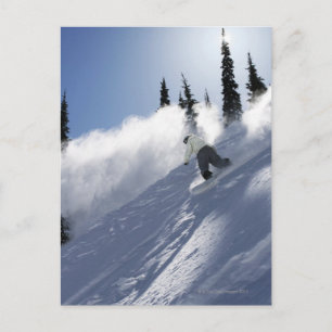 Ein männliches Snowboarder-Ripping-Pulver in Idaho Postkarte