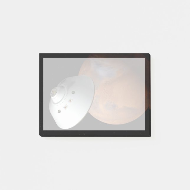 Ein mit Aeroshell angereichertes Raumfahrzeug nähe Post-it Klebezettel (Vorderseite)