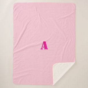 Ein Monogramm rosa Fleece-Blankon Sherpadecke