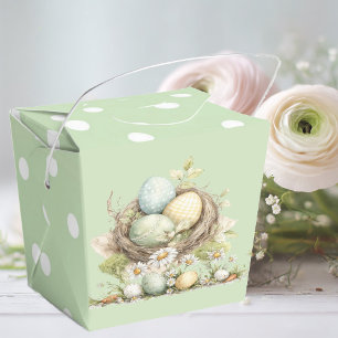 ein Mutterkaninchen und ihr Babykaninchen auf eine Geschenkschachtel