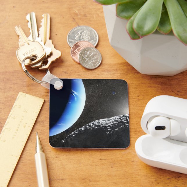 Ein Neptun ist ein winziges Mondlager. Schlüsselanhänger (Schreibtisch)