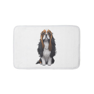 Ein niedlicher Hund König Charles Spaniel Badematte