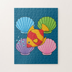 Ein orangefarbener tropischer Fisch und pastellfar Puzzle