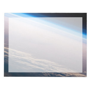 Ein orbitaler Sonnenuntergang vor der Küste von Ca Notizblock