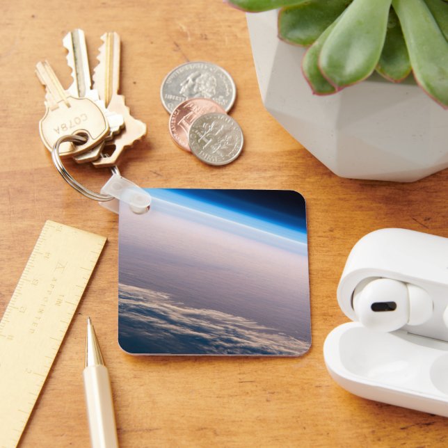 Ein orbitaler Sonnenuntergang vor der Küste von Ca Schlüsselanhänger (Schreibtisch)