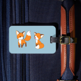 Ein Paar Niedlichen kleinen Fuchs auf blau Gepäckanhänger