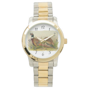 Ein Paar Ring mit halshaltigem Fasan in einem Gras Armbanduhr