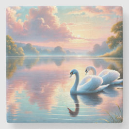 Ein Paar Schwäne, die auf einem ruhigen See gleite Steinuntersetzer