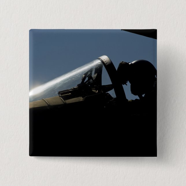 Ein Pilot bereitet den Start vor Button (Vorderseite)