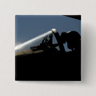 Ein Pilot bereitet den Start vor Button